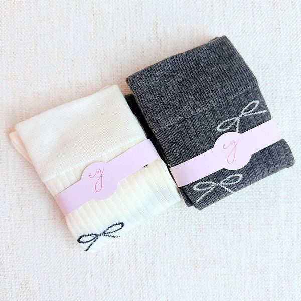 Add a touch of elegance to your outfit with our Bow Minimalist Socks Set of 2. Soft, stylish, and neutral — perfect for everyday or workwear loo