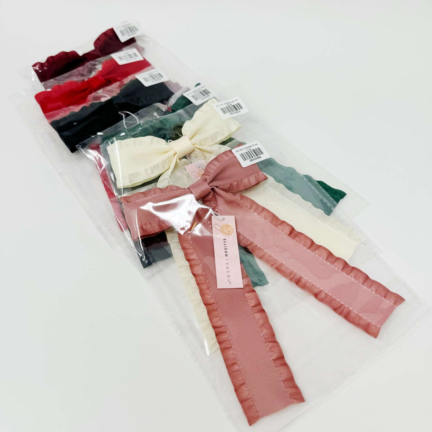 Packaged hair Game Frill Bow Hair Clip for bow lovers, hair accessories must have ribbons with colorful bows on a white background