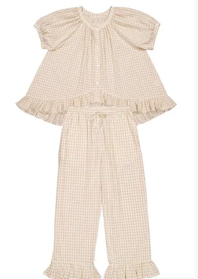 Beige checkered outfit with ruffled top and pants on a white background