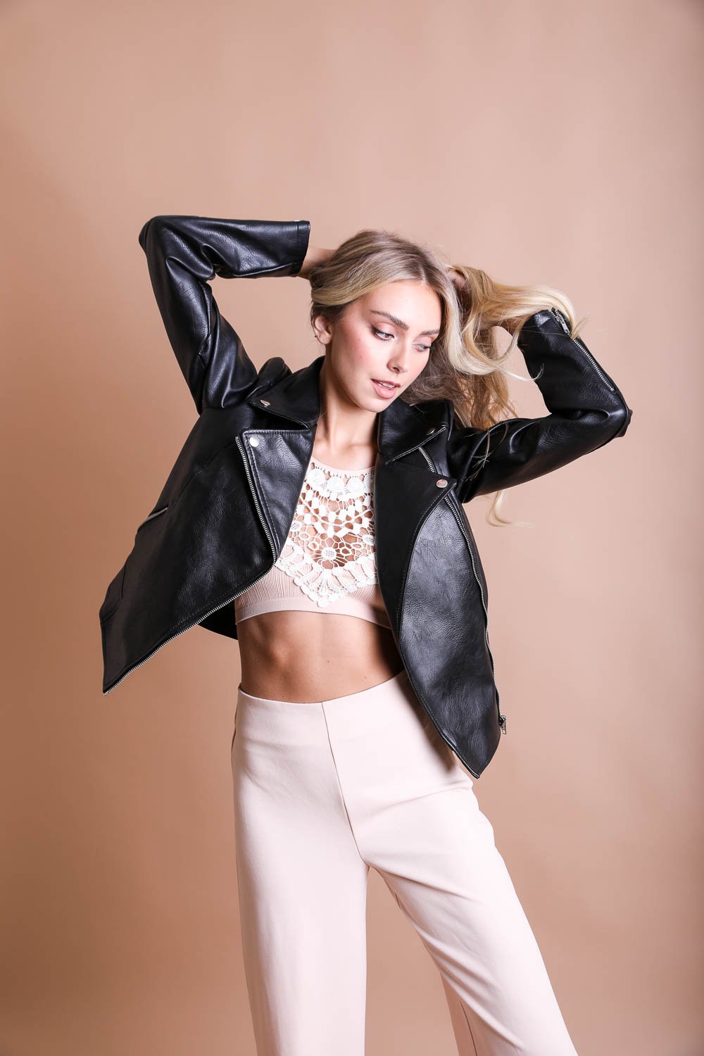 Halter crochet lace blush bralette with intricate design.