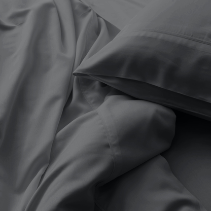 Close-up of dark gray fabric with folds