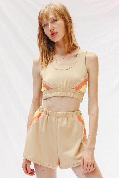 woman wearing a Retro Lounge Shorts Set ; shorts and sports bra style top