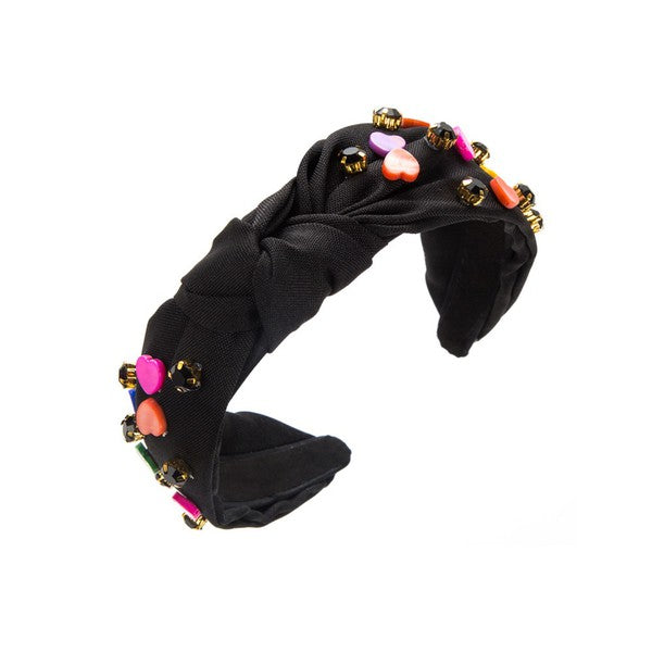 Black headband with colorful beads on a white background