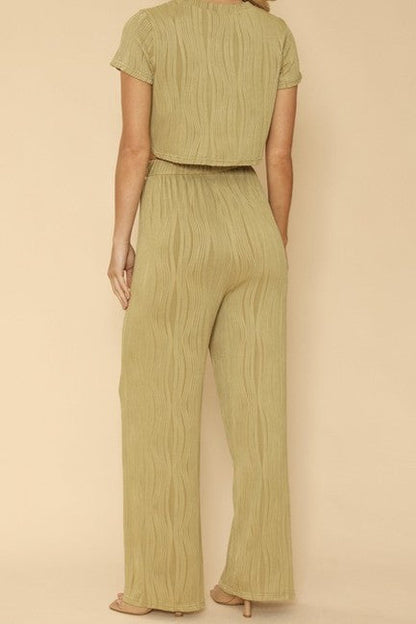 back view of woman woman wearing  Two-Piece Set: Pleated Crop Top & Wide-Leg Pants for Effortless Style  in green