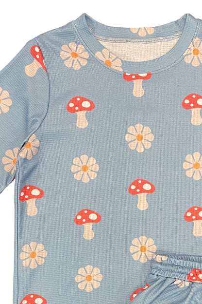 womens and girls outfit with mushroom and flower pattern on a blue background
