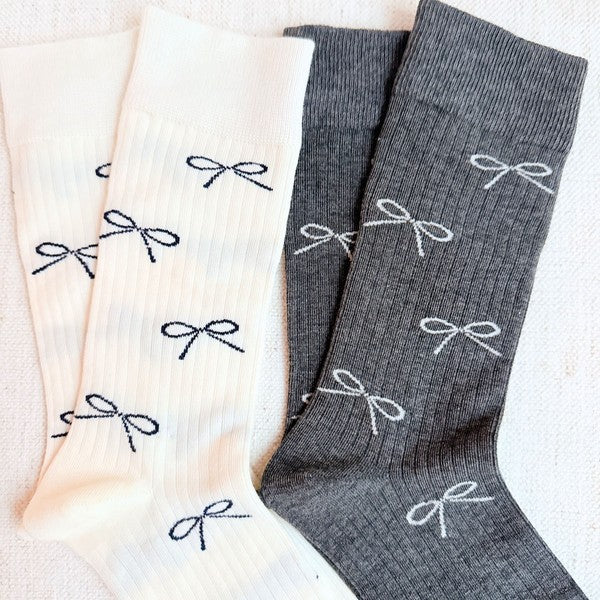 Add a touch of elegance to your outfit with our Bow Minimalist Socks Set of 2. Soft, stylish, and neutral — perfect for everyday or workwear look