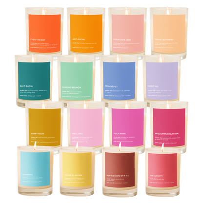 Set of candles with colorful labels on a white background