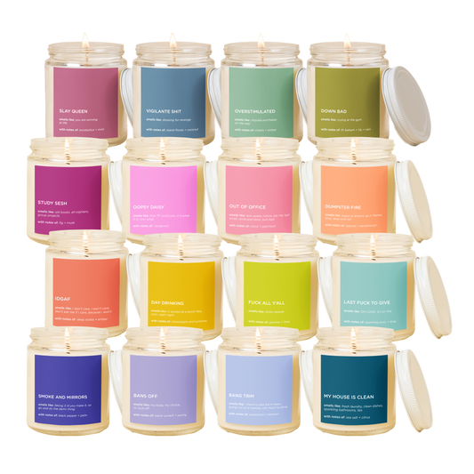 Set of candles with colorful labels on a white background
