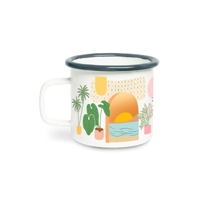 Enamel mug with a colorful design of plants and a sunset on a white background