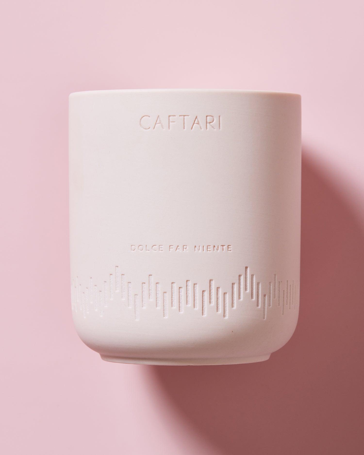 Cafetari candle on a pink background