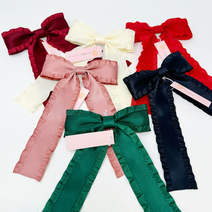 Collection of colorful Game Frill Bow Hair Clip for bow lovers, hair accessories must hav bows on a white background