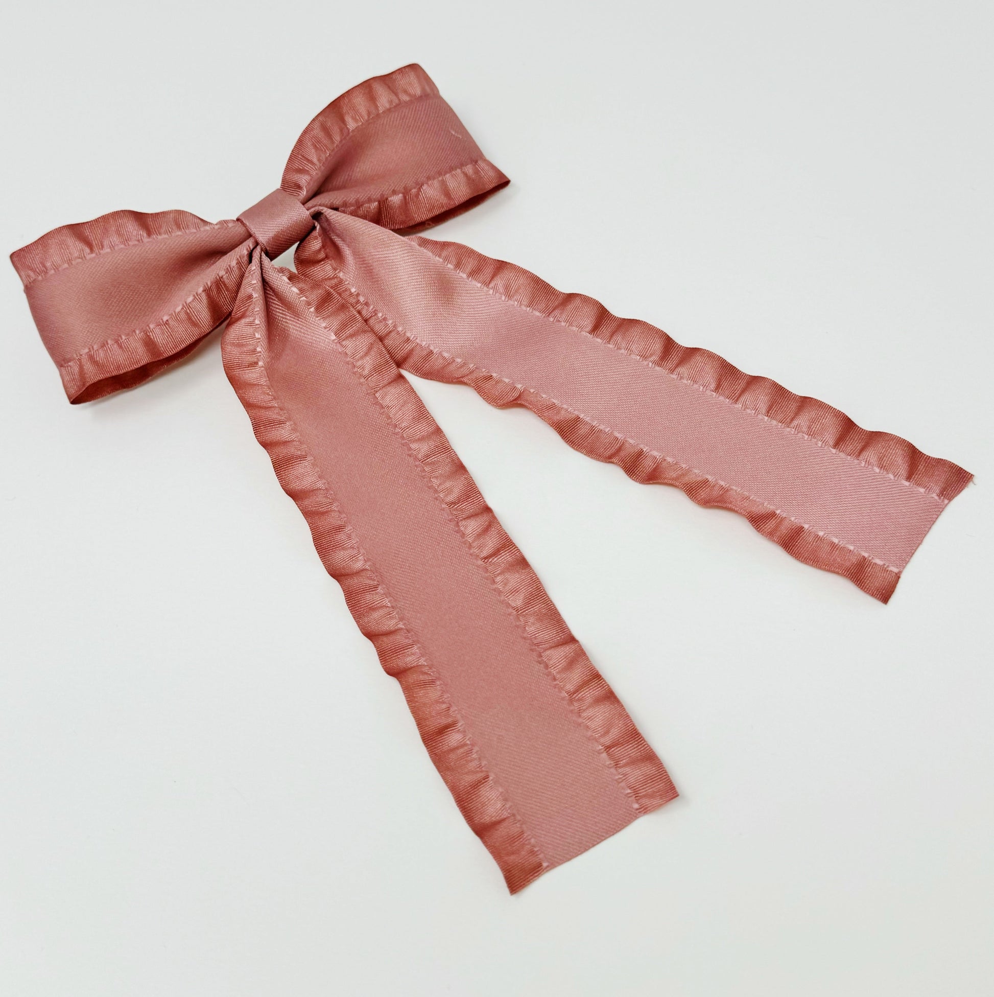 Pink satin Game Frill Bow Hair Clip for bow lovers, hair accessories must have bow on a light gray background