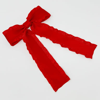 Red Game Frill Bow Hair Clip for bow lovers, hair accessories must have bow on a light gray background