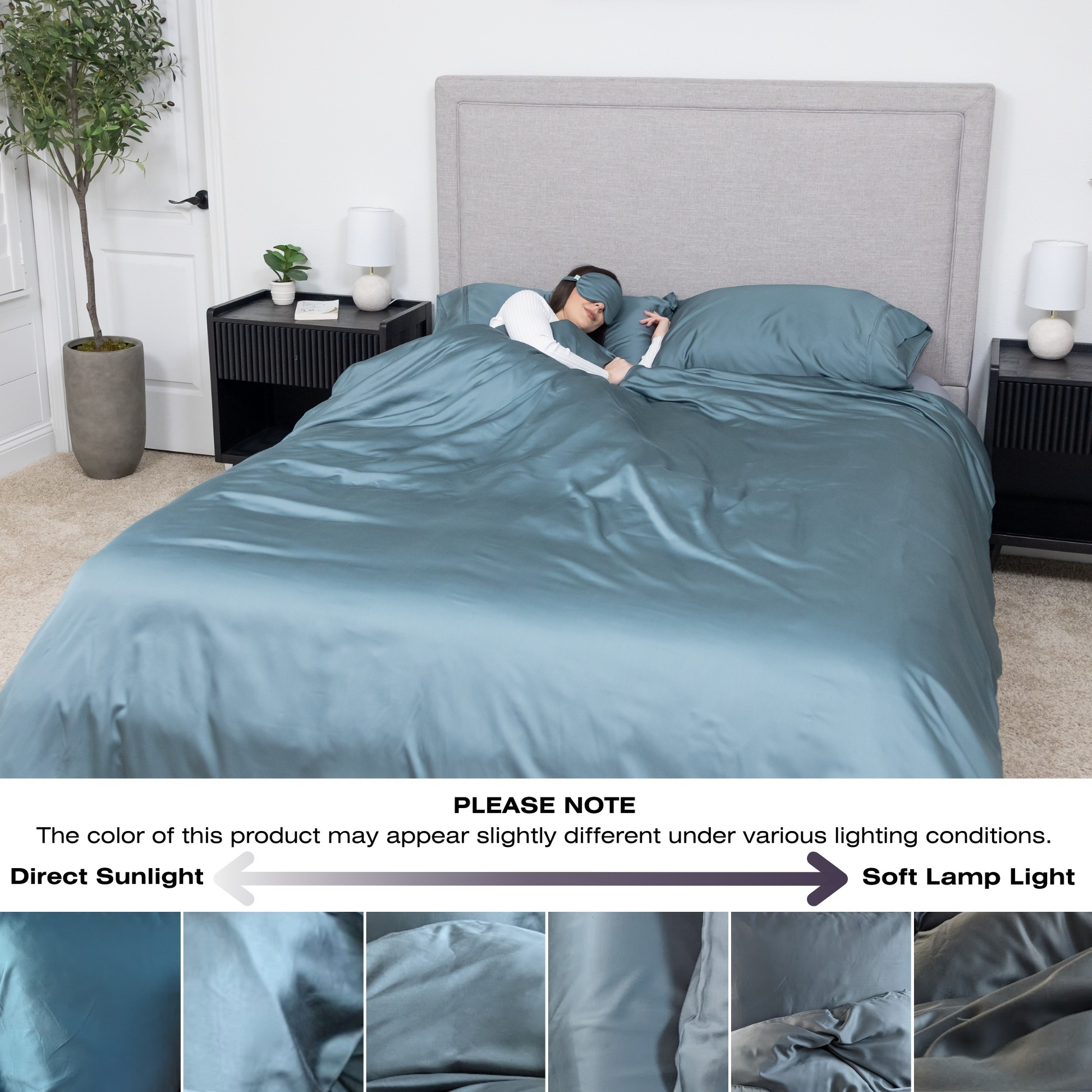 Person lying in bed under blue satin sheets with a gray headboard. Luxurious Organic Bamboo Duvet Cover Set
