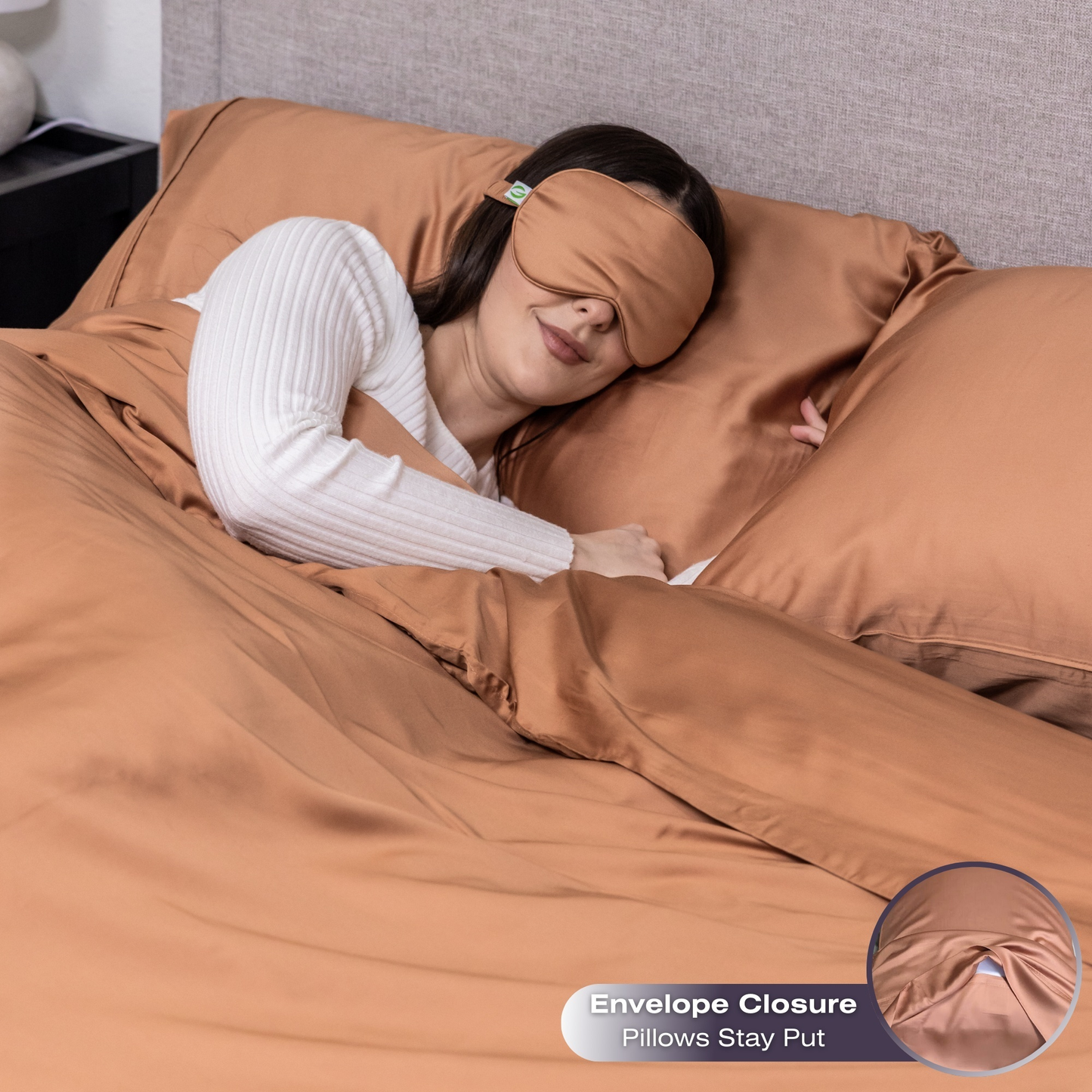Woman sleeping under brown bedding with an eye mask, surrounded by brown pillows. Luxurious Organic Bamboo Duvet Cover Set