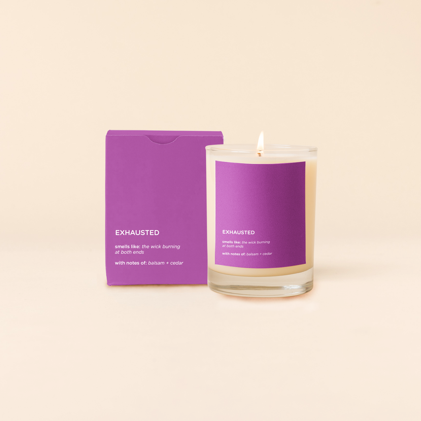 Candle with purple packaging labeled 'Exhausted' on a beige background