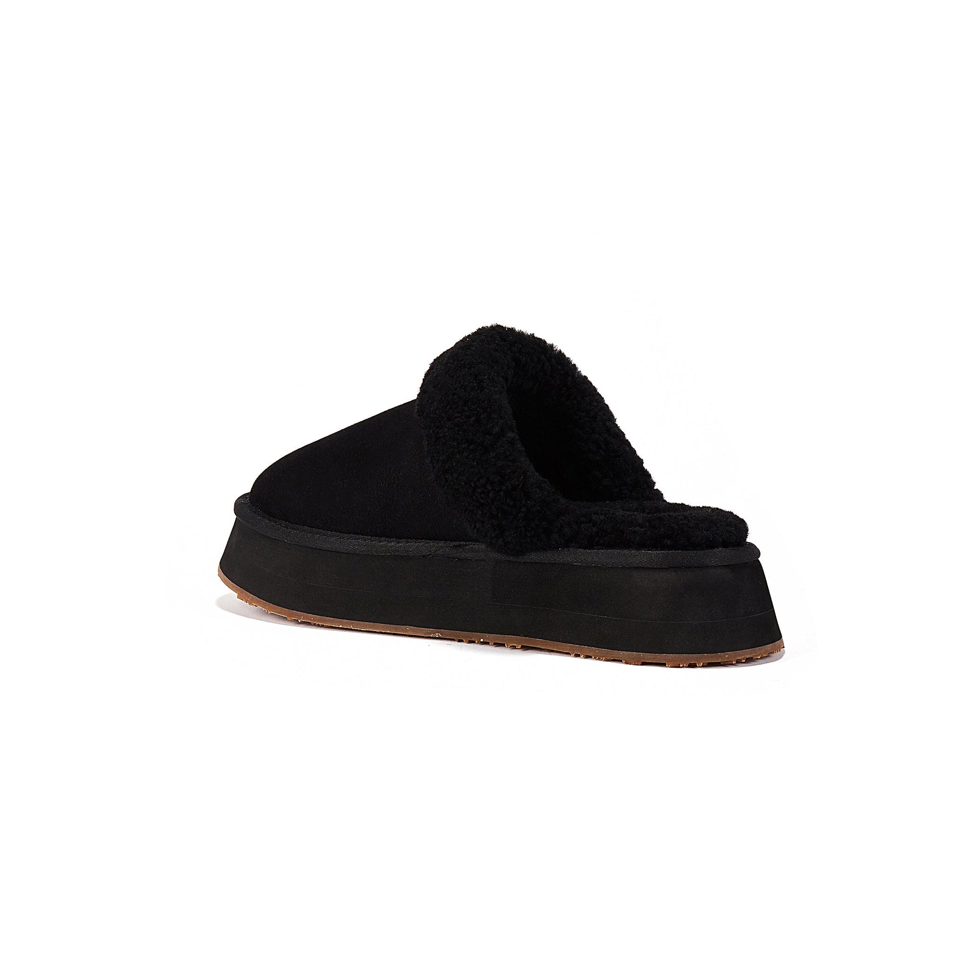Black slipper with a thick sole on a white background