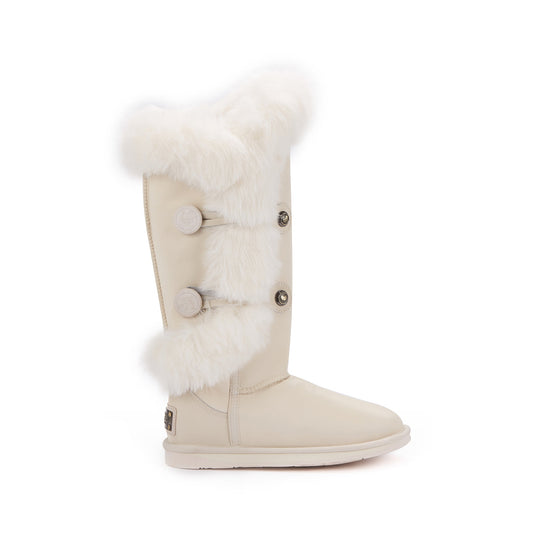 Beige boot with white fur trim on a white background