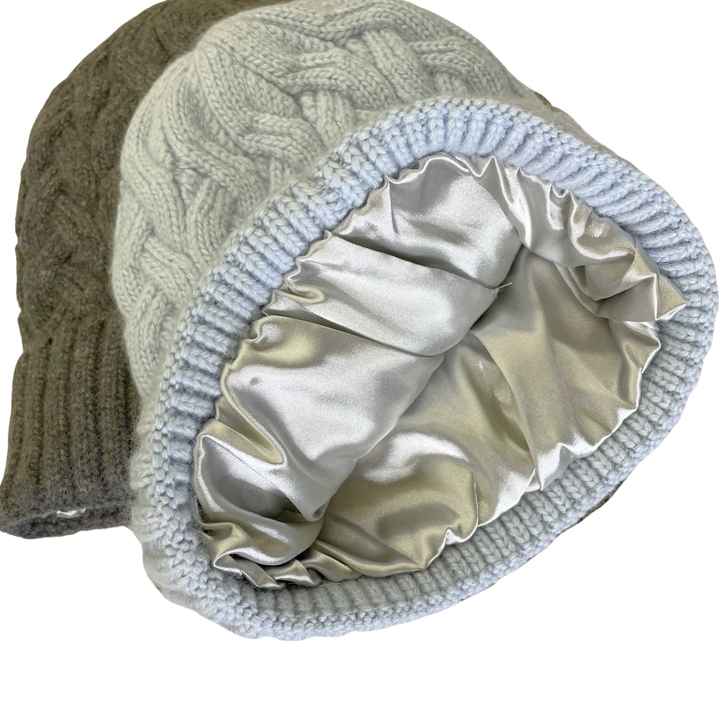 Knitted beanie with a satin-lined hood on a white background