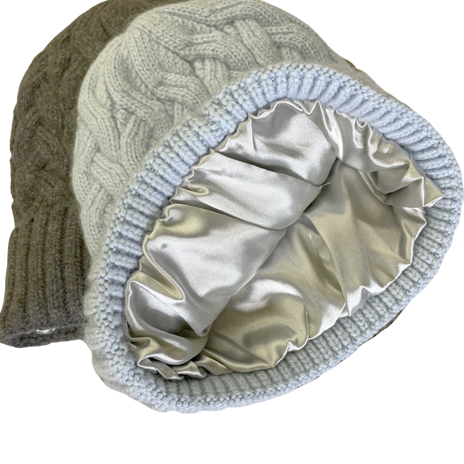 Knitted beanie with a satin-lined hood on a white background