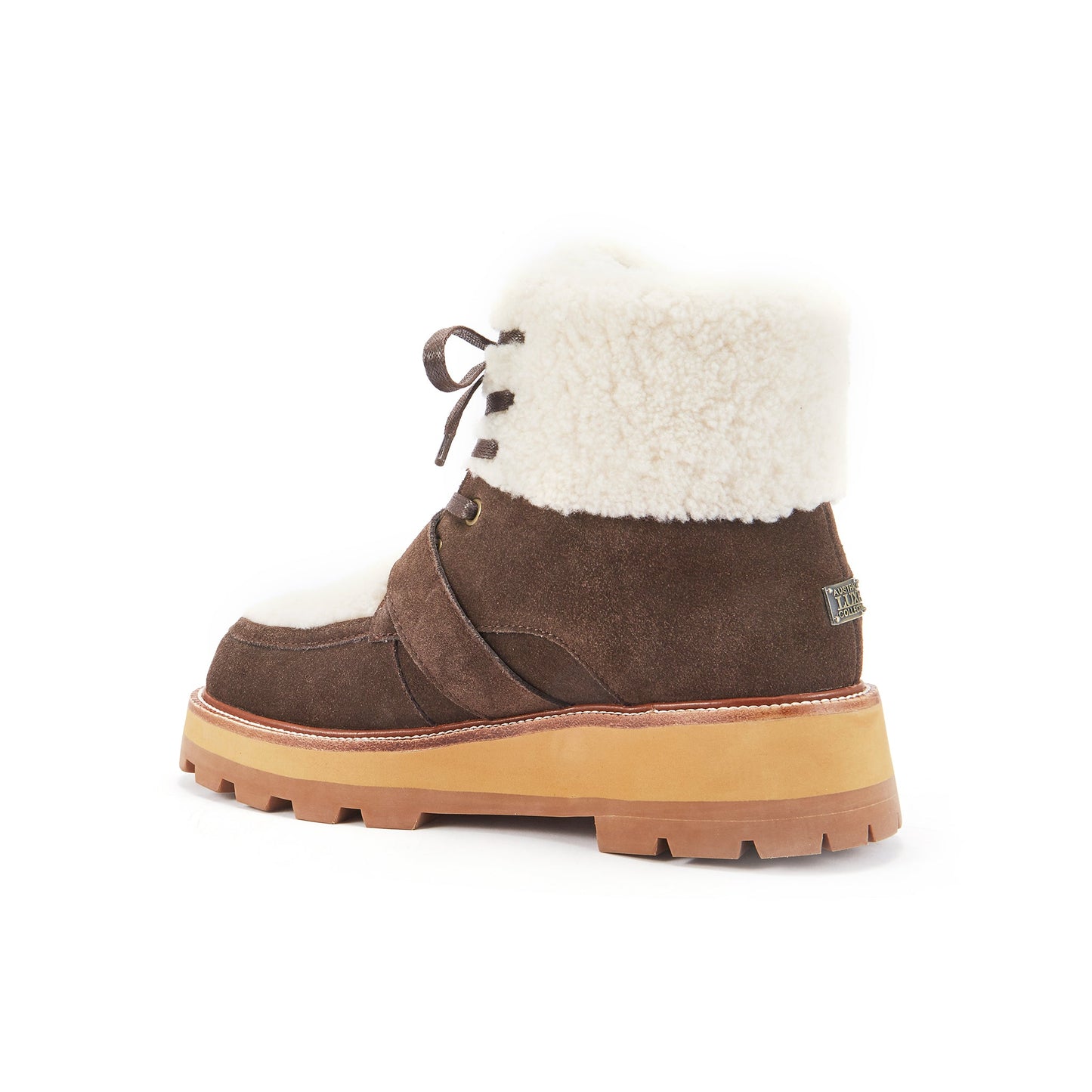 Brown winter boot with white fur lining on a white background