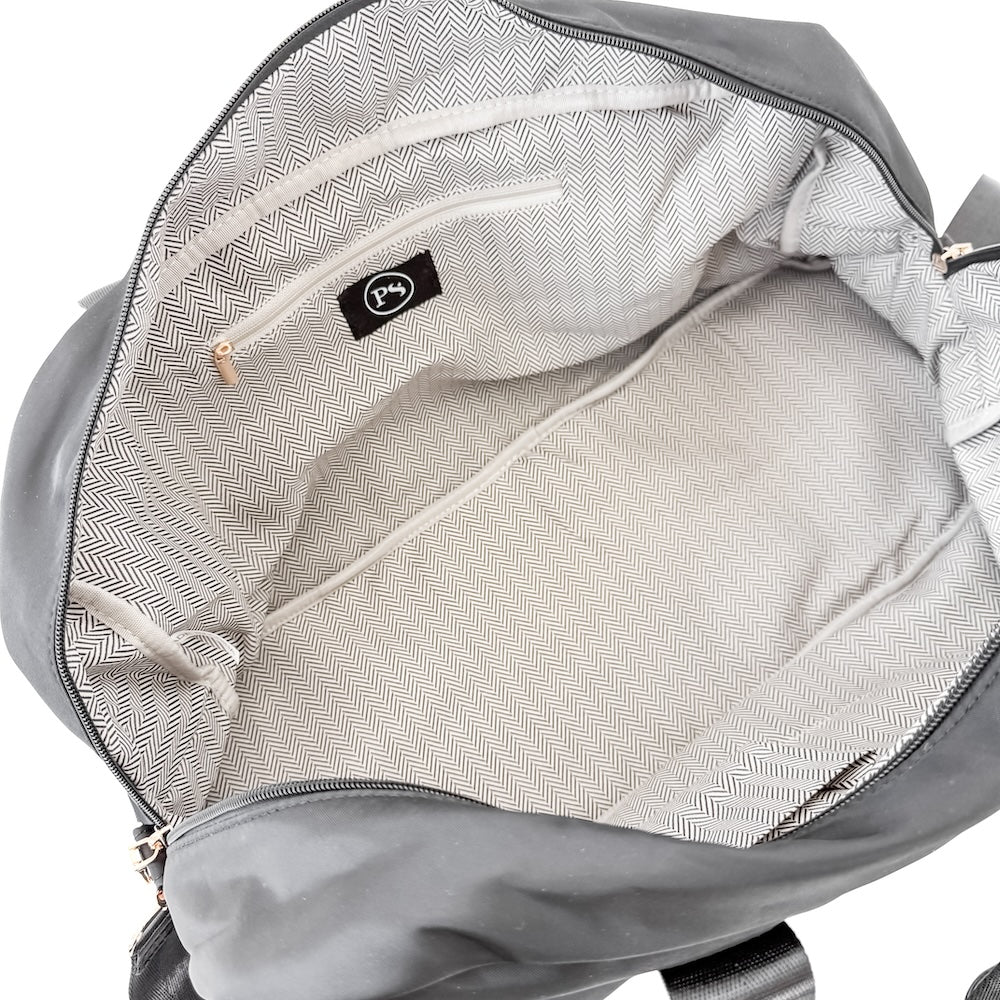 Gray backpack with a visible brand logo on a white background