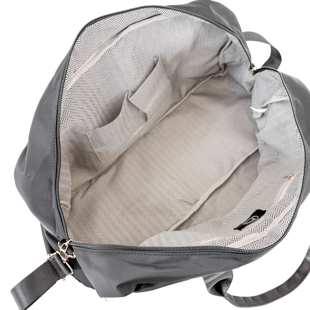 Gray backpack with open front compartment showing interior details on a white background