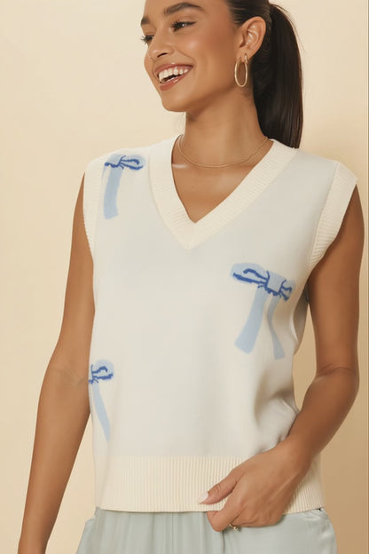 All Over Bow Knit Vest | Soft Pastel V-Neck Sweater Vest with Bow Design | Cute Feminine Layer for Every Season