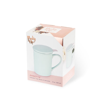 Boxed ceramic tea mug and infuser with 'Pinkie Up' branding on a white background