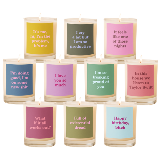 Set of candles with colorful labels on a white background